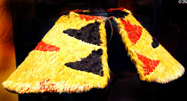 Feathered shoulder cape ('ahu'ula) worn by Bernice Pauaki as a child at Bishop Museum. Honolulu, HI.