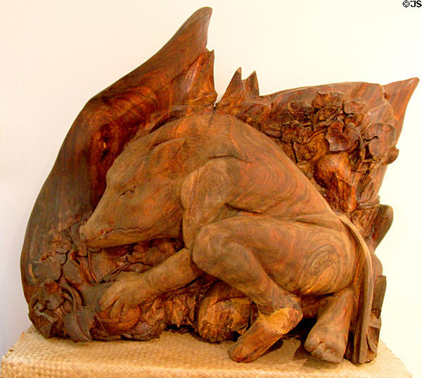Sculpture (1990s) of demigod Kamapua'a by Kawika Eskaran at Kualoa Ranch. HI.