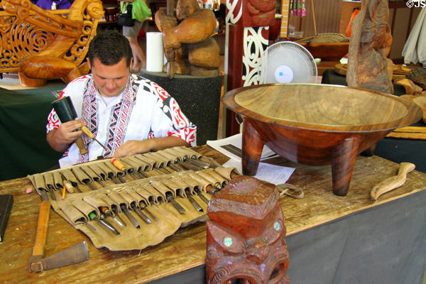 Wood carver at Polynesian Cultural Center. Laie, HI.
