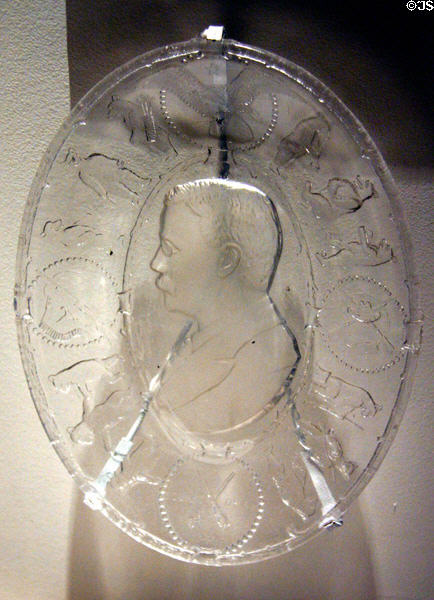 Pressed glass plate of Teddy Roosevelt surrounded by teddy bears at Historical Museum of Iowa. Des Moines, IA.