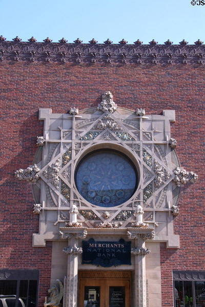 Extravagant decoration on front of Merchants' National Bank. Grinnell, IA.
