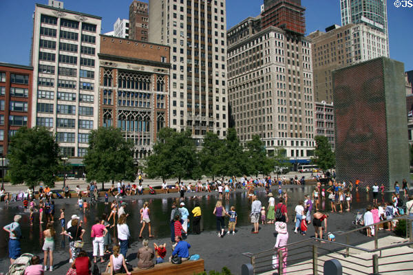 Buildings of Michigan Avenue over Crown Fountain of Millennium Park. Chicago, IL.