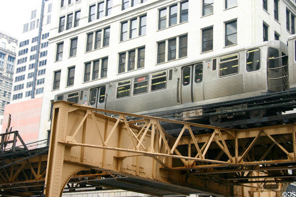 Elevated loop cast iron track sections over streets of Chicago. Chicago, IL.