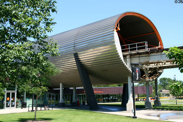 MTCC with concrete & stainless steel tube through which Green Line elevated commuter rail passes. Chicago, IL.
