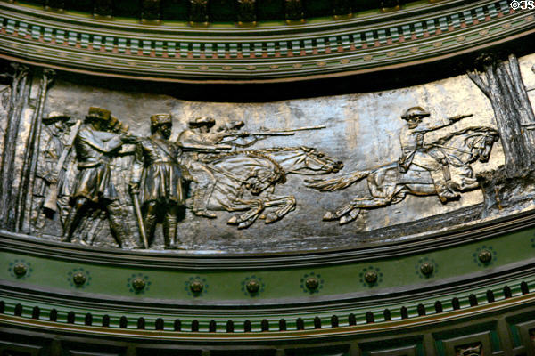 Relief of mounted frontier soldiers charging enemy in Illinois State Capitol. Springfield, IL.