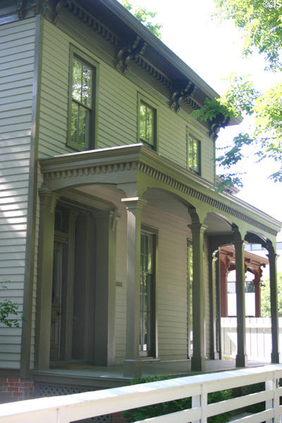 Green house on 8th Street, part of Lincoln Home historic park. Springfield, IL.