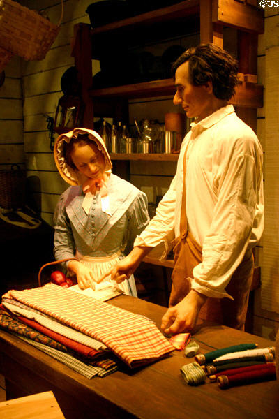 Tableau of Lincoln as young man clerking in New Salem store at Abraham Lincoln Presidential Museum. Springfield, IL.