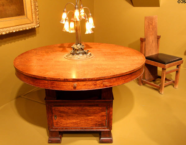 Library table (1896) by Frank Lloyd Wright & made by John W. Ayers Co. with Tiffany Lily lamp (1902-17) at Art Institute of Chicago. Chicago, IL.