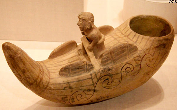 Moche ceramic vessel in form of fisherman in reed boat (100 BCE-500 CE) from North Coast, Peru at Art Institute of Chicago. Chicago, IL.