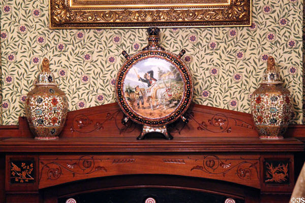 Ceramics on fireplace mantle in parlor at Benjamin Harrison Presidential Site. Indianapolis, IN.