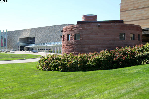 Round entrance structure at Eiteljorg Museum with Indiana State Museum beyond. Indianapolis, IN.
