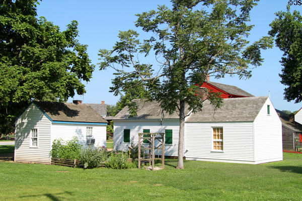 Small white house on let is birthplace (1840) of author Maurice Thompson who wrote novel (1900) "Alice of Old Vincennes" at Indiana State Historic Sites. Vincennes, IN.