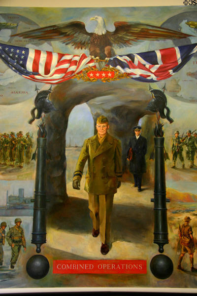 Mural of Eisenhower striding beneath eagle & flags at Eisenhower Museum. Abilene, KS.