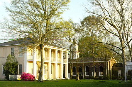 Milbank (former Bank of Jackson) (1835) & Presbyterian church (1852) (Bank & Erin Sts.). Jackson, LA.