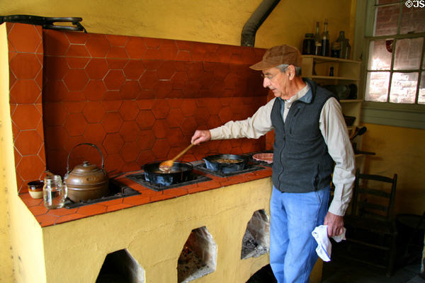 Cooking demonstration at outdoor kitchen of Hermann Grima House. New Orleans, LA.