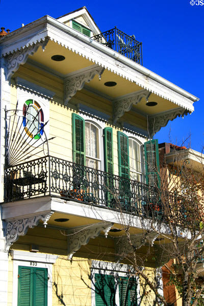 House with brackets & cast-iron decoration (833 Barracks St.) just below Dauphine. New Orleans, LA.