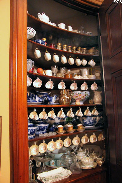 Porcelain in built-in China closet in dining room at Fall River Historical Society Museum. Fall River, MA.