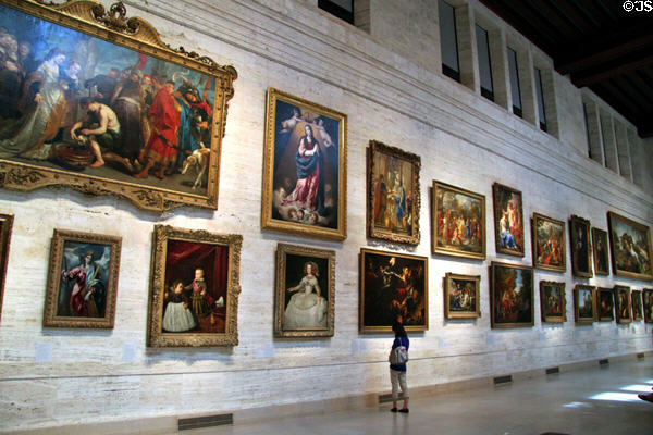 Wall of old masters paintings at Museum of Fine Arts. Boston, MA.