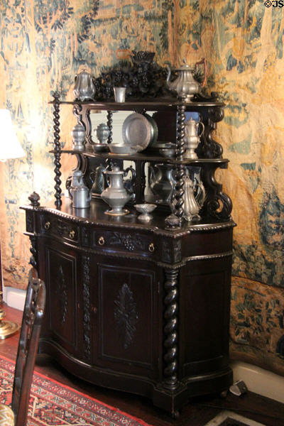 Sideboard with collection of pewter in dining room at Nichols House Museum. Boston, MA.