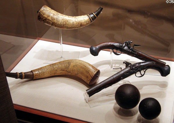 Revolutionary War powder horns & pistols at Concord Museum. Concord, MA.