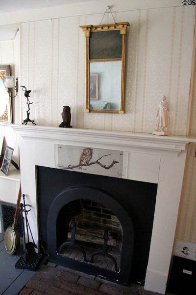 Owl painting by May Alcott on mantle of Louisa May Alcott's bedroom fireplace at Orchard House. Concord, MA.