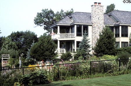 Garden & house facing harbor. Charlevoix, MI.