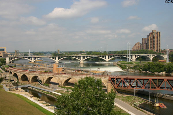 Stone Arch Bridge & Third Avenue Bridge across Mississippi River at Falls of St. Anthony. Minneapolis, MN.