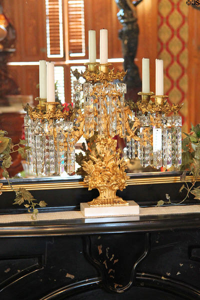 Girandoles shaped as basket of flowers on dining room mantle at Campbell House Museum. St. Louis, MO.
