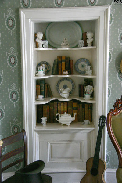 Becky Thatcher House parlor book & china case at Mark Twain Boyhood Home & Museum. Hannibal, MO.