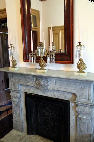 Fireplace with girandoles at Vaile Mansion. Independence, MO.