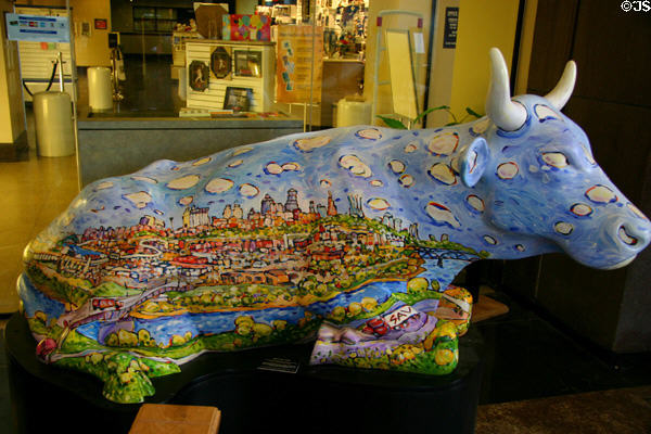 Bistate Cow sidewalk art (2001) by Mike Savage at Kansas City Union Station. Kansas City, MO.