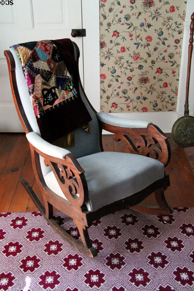 Rocking chair with quilt at John Wornall House Museum. Kansas City, MO.