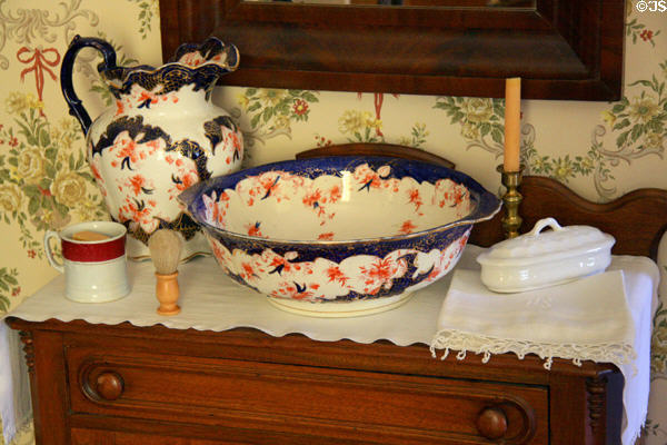 Wash basin & pitcher atop dresser in Oaks House Museum. Jackson, MS.