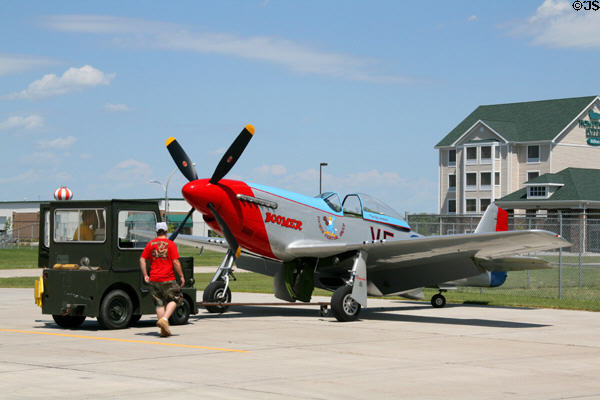 North American P-51D Mustang being moved onto taxiway for test flight at Fargo Air Museum. Fargo, ND.