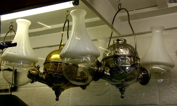 Angle lamps (1885) invented to give more light in less space at Warp Pioneer Village. Minden, NE.