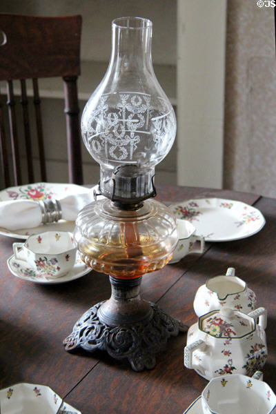 Kerosene lamp on table at Robert Frost Farm. Derry, NH.