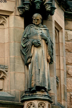 Sculpture of academic in robes in courtyard of East Pyne Hall. Princeton, NJ.