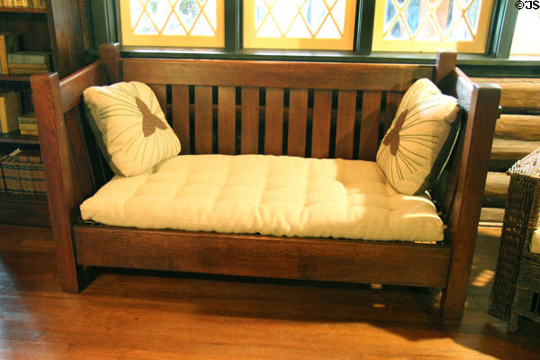 Arts & Crafts oak vertical board settle plus cushions at Stickley Museum at Craftsman Farms. Morris Plains, NJ.