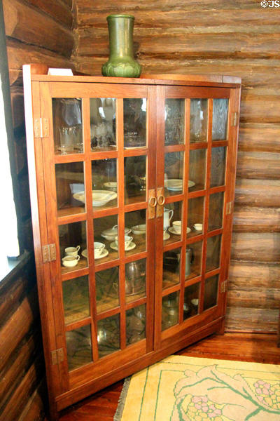 Oak corner cabinet (c1910-11) by Craftsman Workshops of Eastwood, NY at Stickley Museum at Craftsman Farms. Morris Plains, NJ.