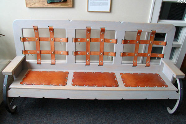 Questa style bench (1991) by Roberto Vigil in NM State Capitol Art Collection. Santa Fe, NM.