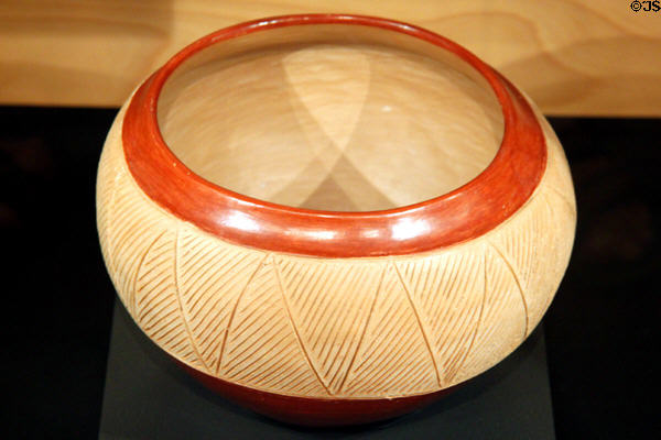 Potsuwi'i incised native pottery jar (1935-40) from Ohkay Owingeh, NM at Maxwell Museum of Anthropology. Albuquerque, NM.