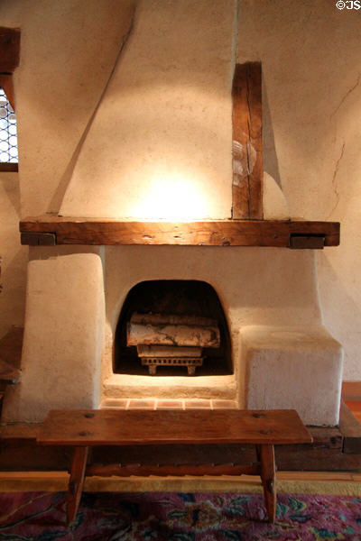 Living room fireplace by Nicolai Fechin at Taos Art Museum. Taos, NM.