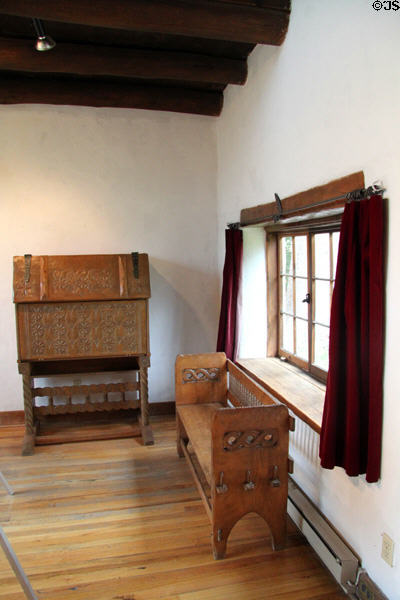 Carved furniture in Nicolai Fechin studio at Taos Art Museum. Taos, NM.
