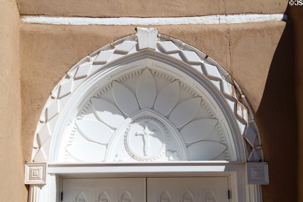 Wood surround of main door of San Francisco de Asis Church. Taos, NM.