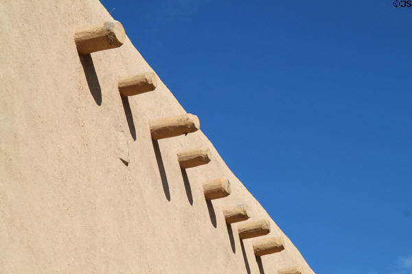 Log beams supporting roof of San Francisco de Asis Church. Taos, NM.