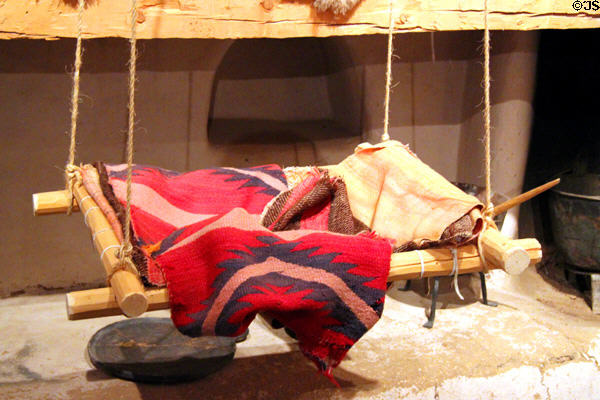 Swinging cradle in kitchen at Hacienda de los Martinez. Taos, NM.