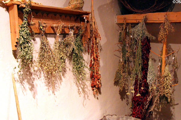 Drying herbs in kitchen at Hacienda de los Martinez. Taos, NM.