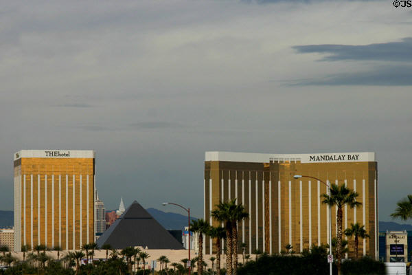 THE Hotel (2004) (43 floors), part of Mandalay Bay Hotel complex flank Luxor pyramid. Las Vegas, NV. Architect: Klai Juba Architects + WorthGroup.