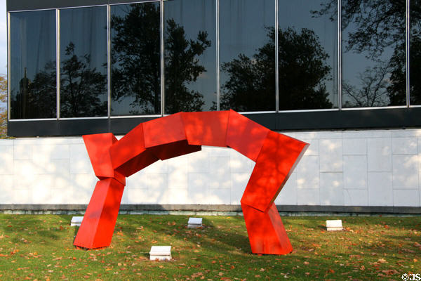Red sculpture against facade of addition to Albright-Knox Art Gallery. Buffalo, NY.