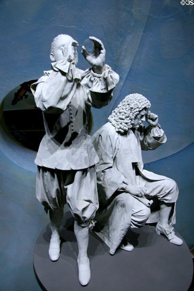 Sculpture of spectacle maker Hans Lippershey & Leeuwenhoek's discoveries of principles of telescope at Corning Museum of Glass. Corning, NY.